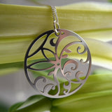 Floral Circle Pendant in stainless steel